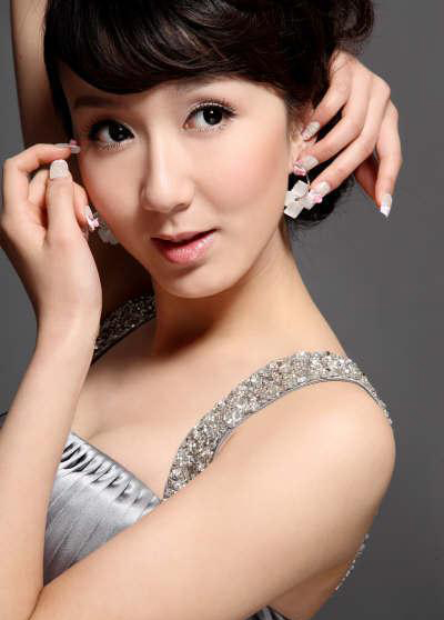 PS给美女图片简单化的美白及润色效果